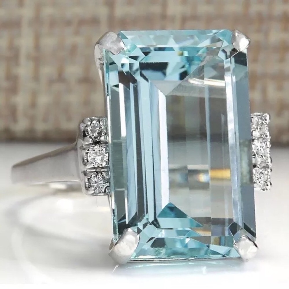 .925 Sterling Silver 18 Carat Blue Topaz Ring!